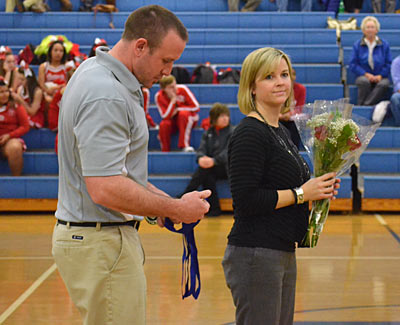 Polk County head coach Brandy Alm and husband/assistant coach Billy Alm led the Wolverines to best win total in seven years.
