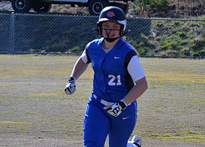 Polk County's Autumn Owen was all smiles after belting a solo home run in Wednesday's win.