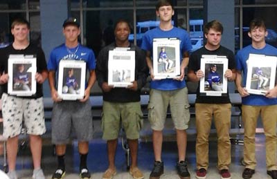 Polk County seniors, from left, Konner Scruggs, Mark Mazzilli, Dequan Gary, Morgan Groves, Tyler Campbell and Bryce Martin