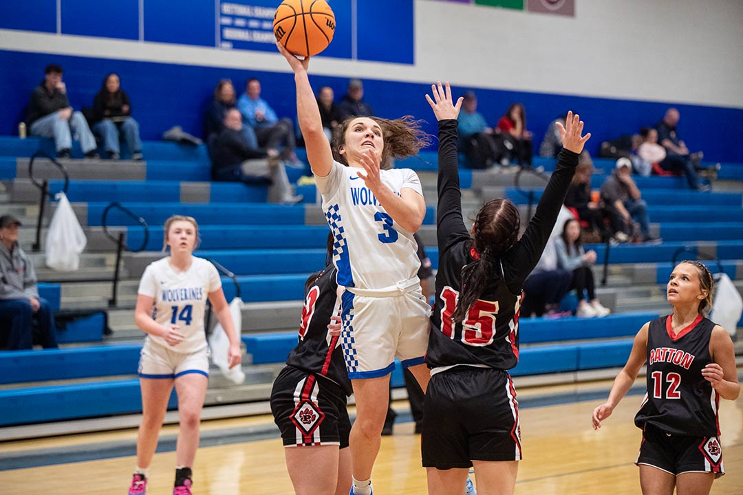 Bailey Staton takes the shot Tuesday that put her atop Polk County's career scoring list, a fourth-quarter jumper for the 1,638th point of her career.