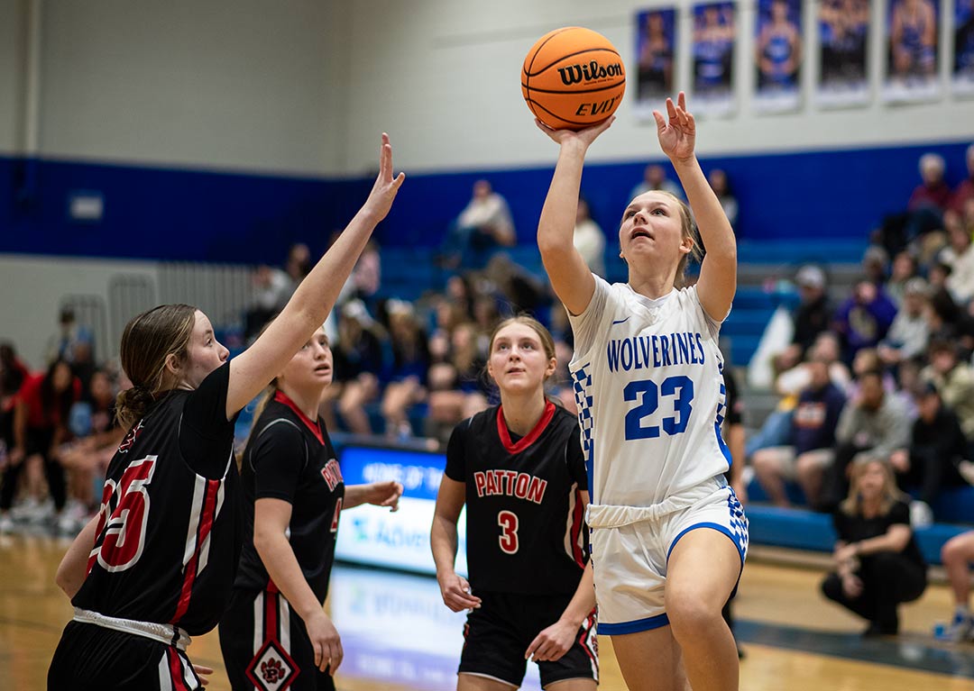 Polk County's Camdyn Israel-Garrett drives to the basket during the second half of Tuesday's game