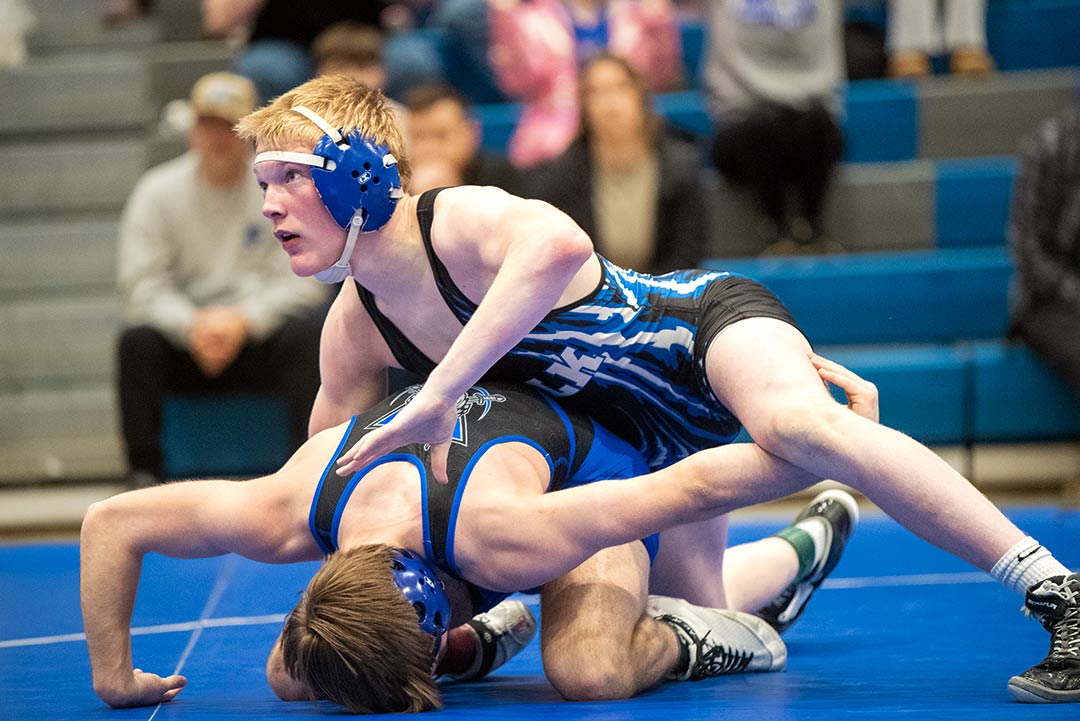 Polk County's Jaxtyn Virgil is one of five Wolverines who advance to the semifinal round of the 3A Wesr Regional