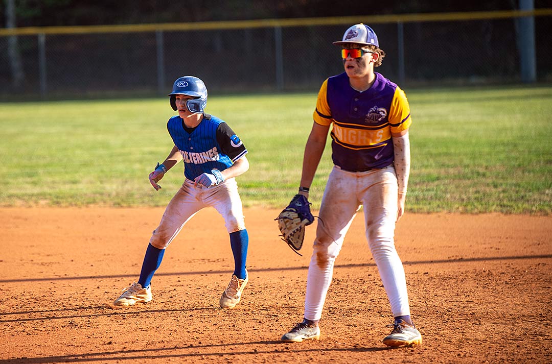 Polk Middle's Joshua Odel dances away from first base late in Thursday's game